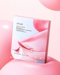 ANUA Peach 70 Niacin Brightening Collagen Mask packaging on a soft pink background, promoting hydration and skin brightness.