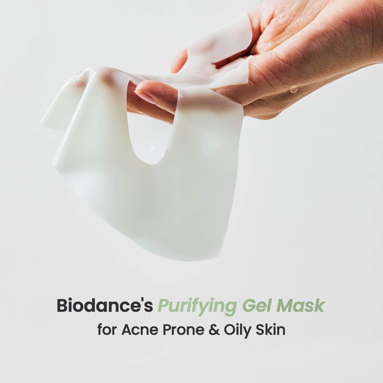 Biodance Purifying Gel Mask held in hand, designed for acne-prone and oily skin, promoting clearer and smoother texture.