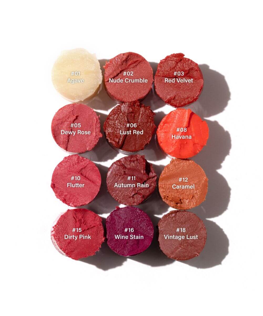 Swatches of Melixir Vegan Lip Butter in various shades: Agave, Nude Crumble, Red Velvet, Lust Red, Havana, Dewy Rose, Flutter, Autumn Rain, Caramel, Dirty Pink, Wine Stain, Vintage Lust.