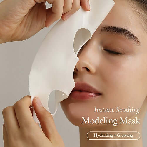 Woman applying FULLY Rice Dough Modeling Mask for soothing, hydration, and a glowing complexion.