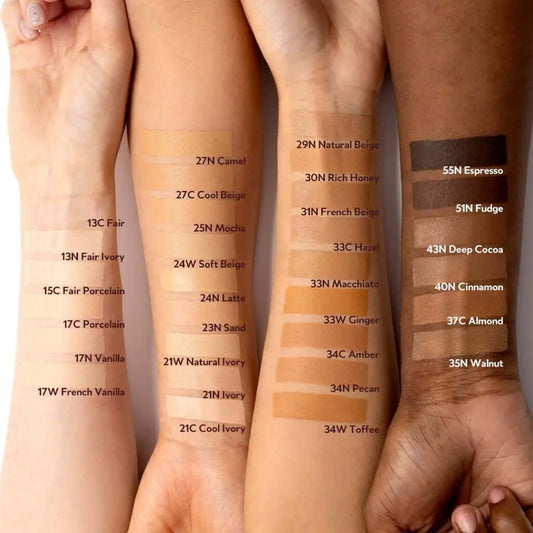 Swatches of various foundation shades on arms, showcasing TIRTIR Mask Fit Red Cushion color range.